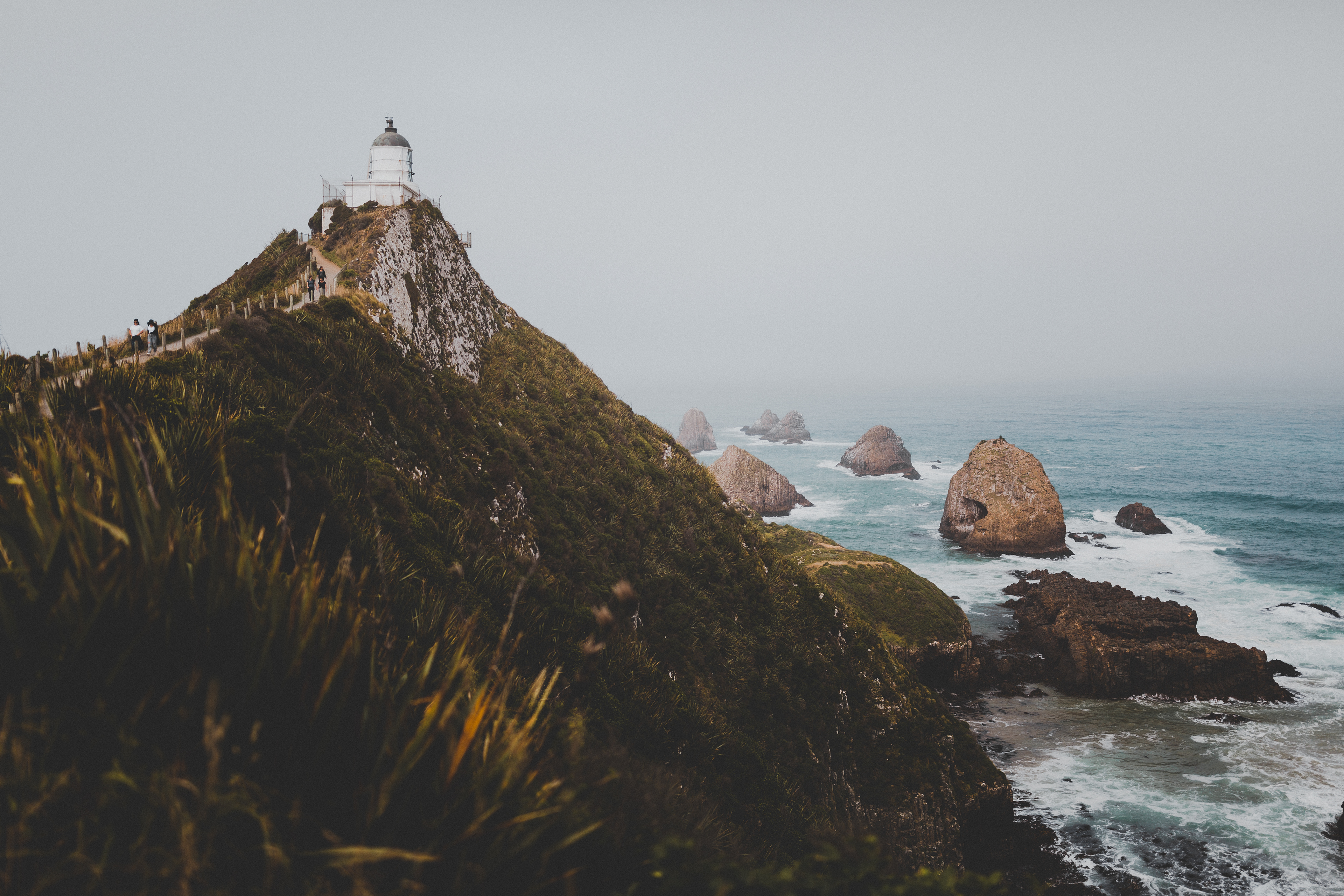 Маяк Наггет поинт. Орегон побережье туман. Castle point Lighthouse in Neuseeland. Coast like